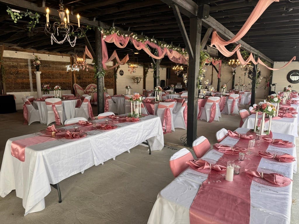 A styled rose gold wedding reception inside the Magnolia Pavilion at Scarborough House near Raleigh, NC