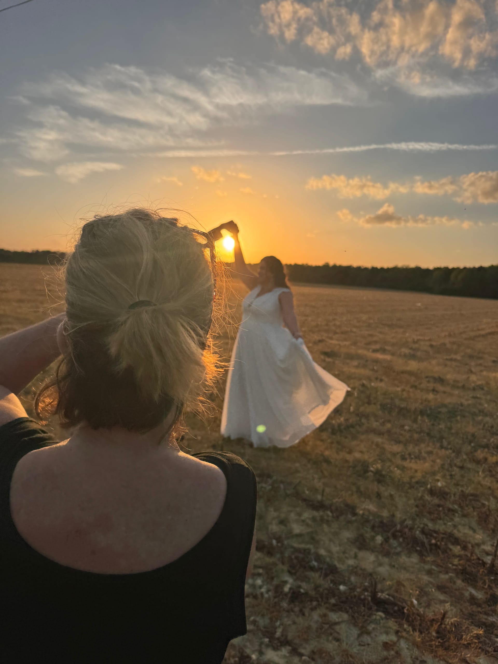 Bride portrait in an open field at golden hour at Scarborough House in eastern NC