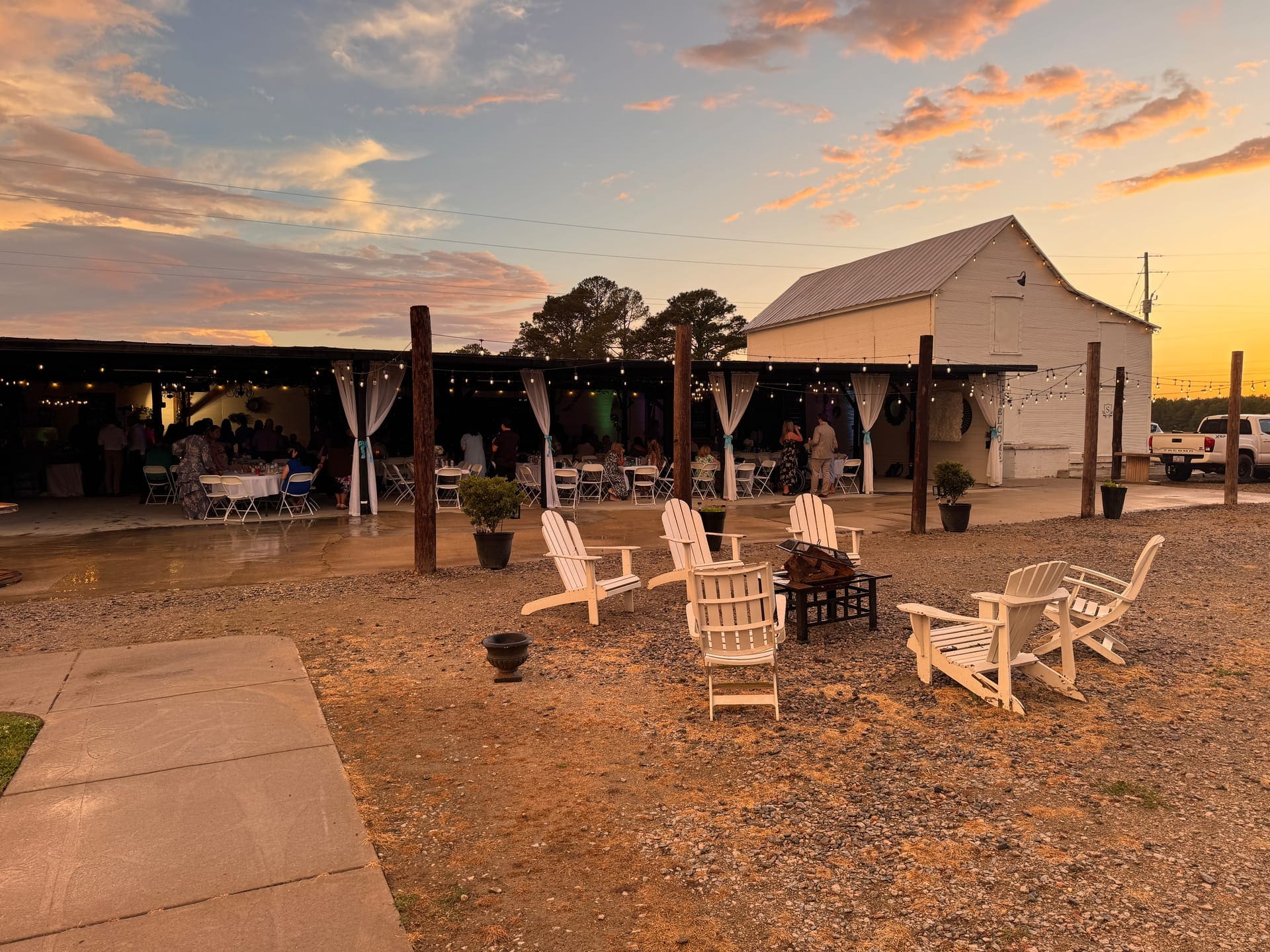 Patio with Adirondack chairs at sunset at Scarborough House