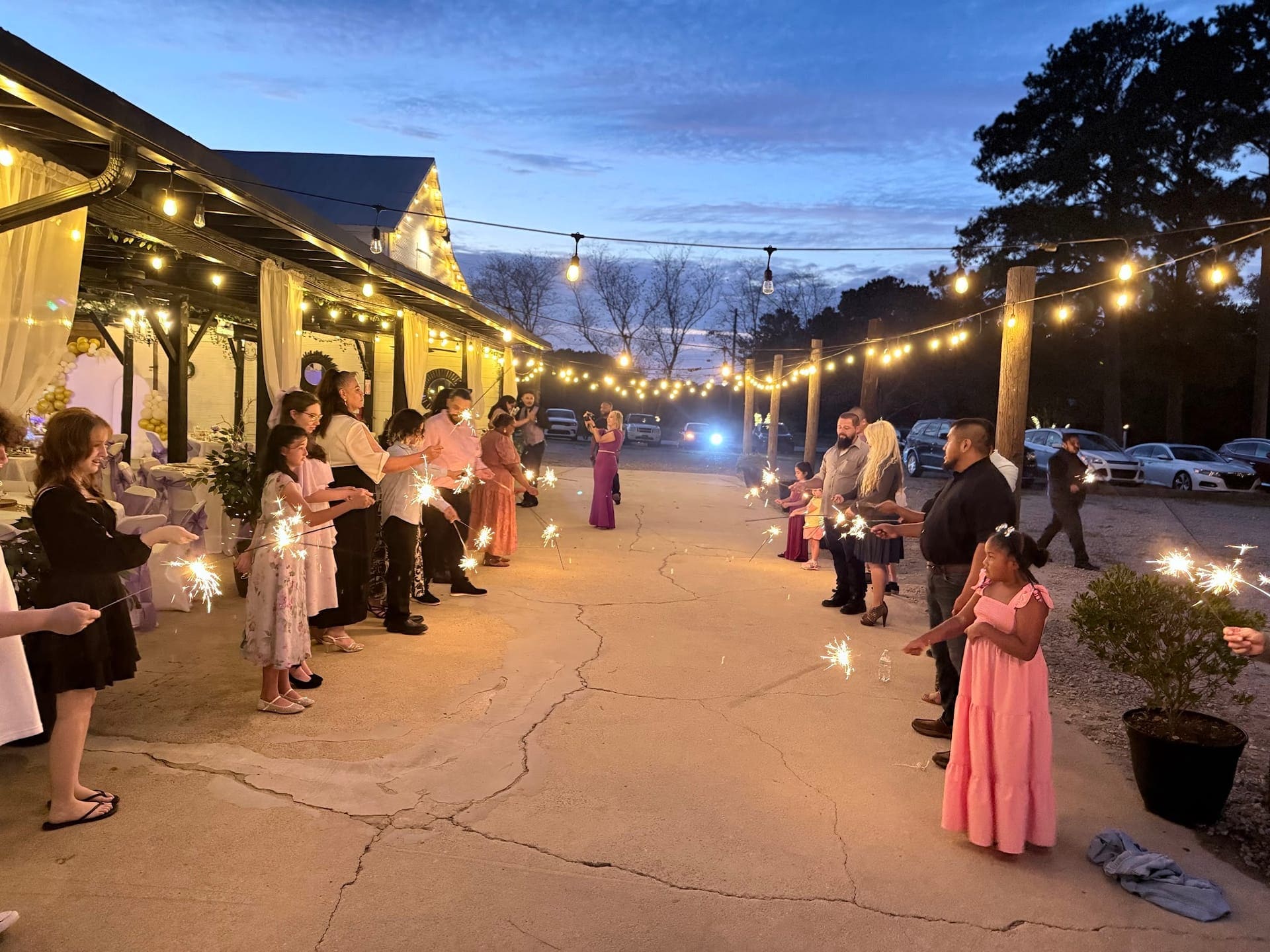 String-lit wedding reception at dusk at Scarborough House
